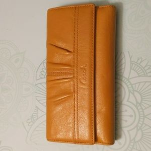 Coach wallet in mustard with check book insert included